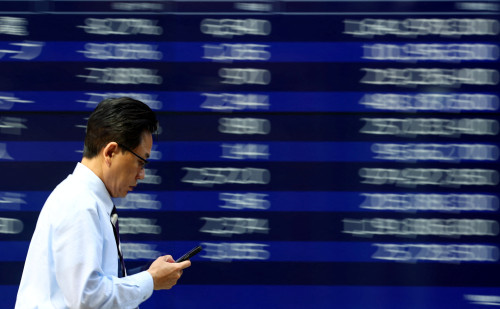 Japan’s Topix hits record high on Wall Street rally, solid earnings
